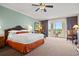 Serene bedroom with plush bedding, balcony access with scenic views, and a dedicated workspace at 8121 Amalfi Pl. # 7-604, Myrtle Beach, SC 29572