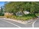 The Marina Inn sign is surrounded by beautiful landscaping at 8121 Amalfi Pl. # 7-604, Myrtle Beach, SC 29572