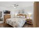 Bedroom with queen bed, ceiling fan, dresser and matching nightstands, creating a cozy space at 9400 Shore Dr. # 507, Myrtle Beach, SC 29572