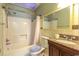 Bathroom featuring a tub and shower combination, vanity with sink, a large mirror and tile floors at 9664 Middleton Ct., Murrells Inlet, SC 29576
