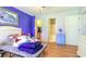 This bedroom features a bed, an adjacent bathroom, and a walk-in closet, offering a practical and comfortable layout at 9664 Middleton Ct., Murrells Inlet, SC 29576