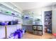 Storage room with open shelving and laminate flooring, allowing for easy organization at 9664 Middleton Ct., Murrells Inlet, SC 29576
