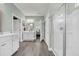 Bright bathroom features double vanities, tile flooring and easy access to walk-in shower at 1009 Oak Marsh Ln., North Myrtle Beach, SC 29582