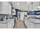 Spacious kitchen featuring white cabinetry, granite countertops, and a functional layout at 1009 Oak Marsh Ln., North Myrtle Beach, SC 29582