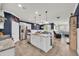 Open concept kitchen with an island, stainless steel appliances, and elegant finishes at 1009 Oak Marsh Ln., North Myrtle Beach, SC 29582