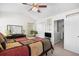 Serene bedroom with generous natural light, a well-sized bed, and a neutral color scheme for a calming and restful environment at 1065 Harvester Circle, Myrtle Beach, SC 29579