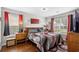Comfortable bedroom featuring a decorative bed, stylish lamps, and vibrant artwork that creates a cozy and inviting atmosphere at 1065 Harvester Circle, Myrtle Beach, SC 29579