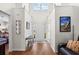 Bright foyer with soaring ceilings, wood floors, and elegant decor at 1065 Harvester Circle, Myrtle Beach, SC 29579