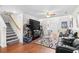 Spacious living room with hardwood floors, staircase, and entertaining area at 1065 Harvester Circle, Myrtle Beach, SC 29579