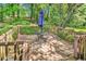 Outdoor wooden deck features a table and chairs for relaxed enjoyment at 1104 Ragin St., Myrtle Beach, SC 29577