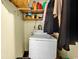Small laundry room with washing machine and shelving for storage at 1104 Ragin St., Myrtle Beach, SC 29577