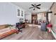 A charming living room with wood floors, an elevated dining area and abundant natural light at 1104 Ragin St., Myrtle Beach, SC 29577