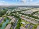 Aerial view of townhome community with ponds, landscaping and community pool at 112 Olde Towne Way # 5, Myrtle Beach, SC 29588