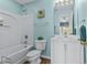 Bright bathroom featuring a shower-tub combination, white vanity, and coordinated decor at 112 Olde Towne Way # 5, Myrtle Beach, SC 29588
