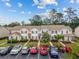 Exterior of multi-Gathering townhomes with parking available to tenants at 112 Olde Towne Way # 5, Myrtle Beach, SC 29588