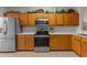 Well-equipped kitchen with stainless steel appliances and ample cabinets at 112 Olde Towne Way # 5, Myrtle Beach, SC 29588