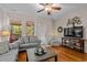 Comfortable living space featuring wood floors and backyard access at 112 Olde Towne Way # 5, Myrtle Beach, SC 29588