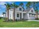 Beautiful two-story home with a well-manicured lawn, lovely landscaping, and an attached garage at 1142 Fiddlehead Way, Myrtle Beach, SC 29579