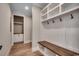Hallway with cubbies, bench, and storage space. Plenty of room for coats and shoes at 1142 Fiddlehead Way, Myrtle Beach, SC 29579
