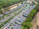 Aerial view of condos with water features, landscaping, parking, and community amenities at 1290 River Oaks Dr. # 7H, Myrtle Beach, SC 29579