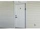 Close-up of the unit front door at 1290 River Oaks Dr. # 7H, Myrtle Beach, SC 29579