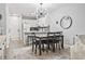 Open concept with a dining area and modern lighting fixtures at 1290 River Oaks Dr. # 7H, Myrtle Beach, SC 29579
