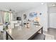 Open living room and dining area with lots of natural light at 1290 River Oaks Dr. # 7H, Myrtle Beach, SC 29579