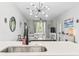 Bright living room area featuring an open concept with modern light fixtures at 1290 River Oaks Dr. # 7H, Myrtle Beach, SC 29579