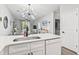 Open concept living and kitchen area with a modern chandelier at 1290 River Oaks Dr. # 7H, Myrtle Beach, SC 29579