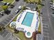 Aerial view of a community pool surrounded by lounge chairs at 1290 River Oaks Dr. # 7H, Myrtle Beach, SC 29579