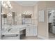 Bathroom featuring a large mirror over the vanity and a glass-enclosed shower at 1315 Cherry Dr., Surfside Beach, SC 29575