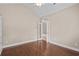 Spacious bedroom with ceiling fan, hardwood flooring and arched doorway at 1315 Cherry Dr., Surfside Beach, SC 29575