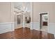Open concept dining room with archway leading into kitchen at 1315 Cherry Dr., Surfside Beach, SC 29575