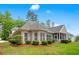 Well-maintained home exterior with manicured landscaping and a lush green lawn and mulch at 1315 Cherry Dr., Surfside Beach, SC 29575