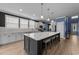 Spacious kitchen with large center island, granite countertops, and stainless steel appliances at 1325 Bermuda Grass Dr., Myrtle Beach, SC 29579