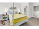 Bedroom featuring a four poster bed and ensuite bathroom at 1340 Jolly Roger Dr., North Myrtle Beach, SC 29582