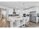 Elegant kitchen with a central island, stainless steel appliances, and bar seating, perfect for entertaining at 1340 Jolly Roger Dr., North Myrtle Beach, SC 29582