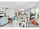 Open-concept home featuring kitchen, dining, and living areas with plenty of natural light at 1340 Jolly Roger Dr., North Myrtle Beach, SC 29582