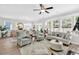 Open-concept living room with an elegant design that flows into the dining area, perfect for entertaining at 1340 Jolly Roger Dr., North Myrtle Beach, SC 29582