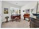 Bright office with desk, piano, and nautical decor near window at 1340 Jolly Roger Dr., North Myrtle Beach, SC 29582
