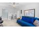 Open bedroom design with seating near a world map decor item, light carpet and natural light at 1444 Thames Ct., Myrtle Beach, SC 29577