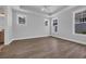 Neutral bedroom with wood flooring, a ceiling fan, and bright natural light at 1533 Coastal Cove Ln, Calabash, NC 28467