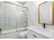 Bathroom featuring a shower over tub with glass doors and a marble vanity at 1533 Murrells Landing Rd., Conway, SC 29526