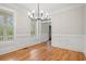 Bright dining area with hardwood floors and a large window offering natural light at 1533 Murrells Landing Rd., Conway, SC 29526