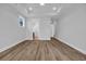 This bedroom has hard wood floors, recessed lighting, and an ensuite bath at 1549 Coastal Cove Ln, Calabash, NC 28467