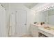 Bright bathroom with a vanity, a large mirror, and a neutral color scheme, creating a relaxing space at 1566 Bessent Ave., Little River, SC 29566