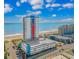 High-rise condo building with ocean views near beach and parking garage at 1605 S Ocean Blvd. # 1909, Myrtle Beach, SC 29577