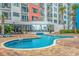 Outdoor pool with brick patio and palm trees at 1605 S Ocean Blvd. # 1909, Myrtle Beach, SC 29577