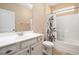 Well-lit bathroom features a vanity with mirror and tub with shower, offering comfort at 189 Ella Kinley Circle # 201, Myrtle Beach, SC 29588