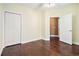 Cozy bedroom with hardwood floors, closet space and white trim, great for relaxation at 189 Ella Kinley Circle # 201, Myrtle Beach, SC 29588